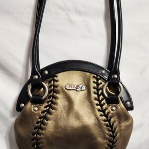 Elegant Gold and Black Shoulder Bag by Red